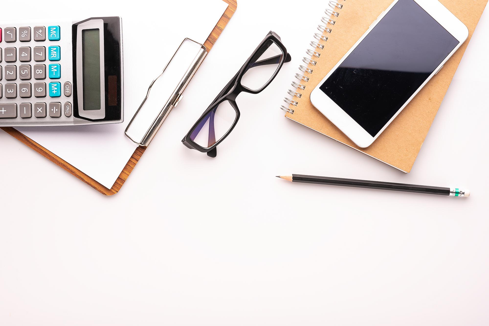Workspace with notebook and calculator